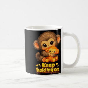 Schlagaffe mit Teddybär kuschelt weiter fest Kaffeetasse