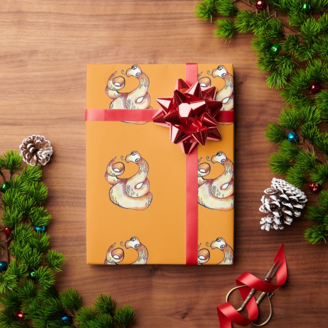Schlange auf Orange Geschenkpapier (Feiertagsgeschenk)