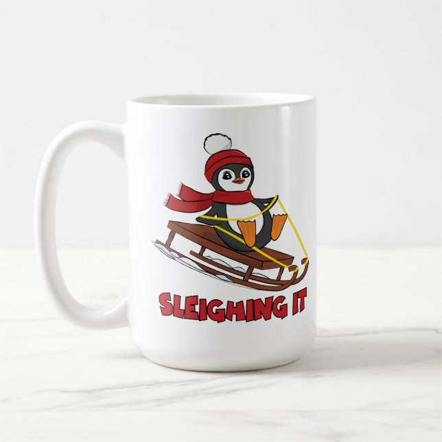 Schlitten - Niedlicher Pinguin im Schnee Kaffeetasse (Links)