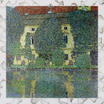 Schloss Kammer am Attersee III von Gustav Klimt Puzzle<br><div class="desc">Schloss Kammer am Attersee, III (1910) von Gustav Klimt ist ein Vintages Symbolismus Viktorianischer Era-Gemälde. Die Aussicht auf das Schloss. In den Gärten wachsen große Bäume. Die Zuhause (eine ehemalige Festung) und die Bäume spiegeln den ruhigen See wieder. Schloss Kammer ist ein Schloss umgeben vom Attersee in Oberösterreich und Gegenstand...</div>