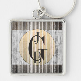 Schlüsselanhänger aus Gold, grauem Marmor und Stre