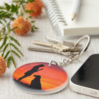 Schlüsselanhänger mit Silhouette von Hund und Besi