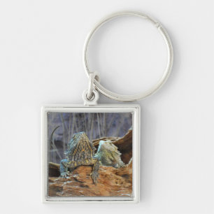 Schlüsselanhänger mit zwei seltsamen Eidechsen