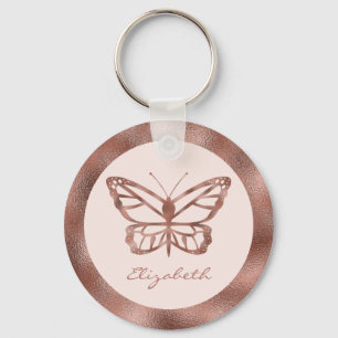 Schmetterling im Rosen-Gold-Look auf rosafarbenem  Schlüsselanhänger