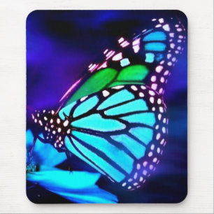 Schmetterling in blauem Licht Mousepad