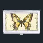 Schmetterling mit Wildblumen Visitenkarten Dose<br><div class="desc">Dieses Stück von Jennifer Goldberger ist Gegenstand eines bunten,  dekorativen Schmetterlings. Wildblumen werden an den Seiten und unter dem riesigen Schmetterling gezeichnet. Eine schöne pastellfarbene Grenze rundet die Szene ab. Bestellen Sie noch heute Ihren Ausdruck!</div>
