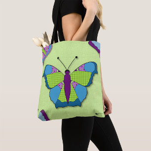 Schmetterling-Patchworkmuster auf Grün
