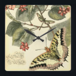 Schmetterling und Libelle mit roten Blumen Quadratische Wanduhr<br><div class="desc">Visions-Studio schuf diese faszinierende Szene eines Schmetterlinges und der Libelle,  die nahe einer Gruppe roten Blumen flattern. Wenn Sie Liebenatur Sie diesen Druck für selbst erhalten. Er würde auch ein fantastisches Geschenk für jemand speziell in Ihrem Leben machen!</div>