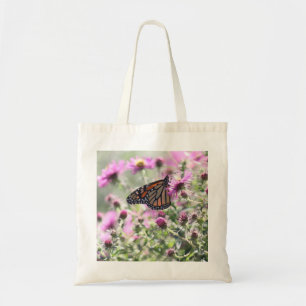 Schmetterling und Lila Blume Tragetasche