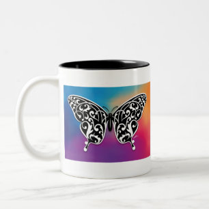 Schmetterlingsdesign mit Sonnenuntergangfarben Zweifarbige Tasse