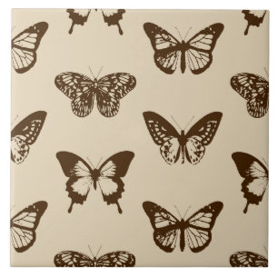Schmetterlingskizze, schokoladenbraun auf Beige Fliese