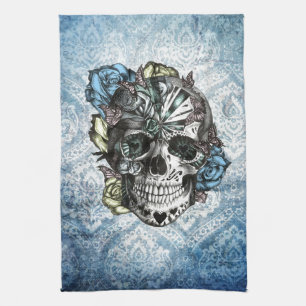 Schmutz-Süßigkeitszuckerschädel in blauem Gelbe Handtuch