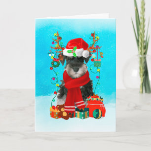 Schnauzer im Schnee mit Weihnachtsgeschenken Karte
