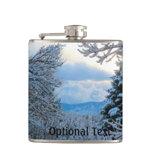 Schnee auf Pinien im Colorado Rocky Mountains Flachmann