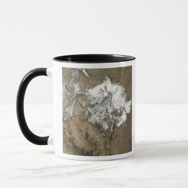 Schnee bedeckt das Rocky Mountains im Vereinigten  Tasse (Links)