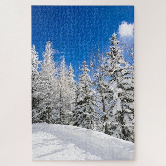 Schneebäume unter einem klaren blauen Himmel im Puzzle (Vertikal)