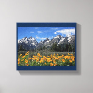 Schneebedeckte Grand Teton Range mit gelben Blumen Leinwanddruck