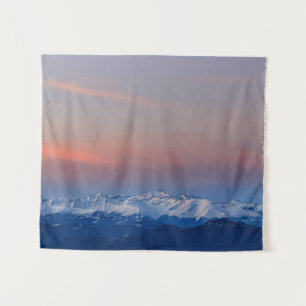 Schneeberge mit zauberhaftem Himmel Wandteppich
