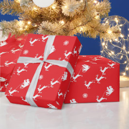 Schneeflocke und Weihnachten mit Schlitten über We Geschenkpapier