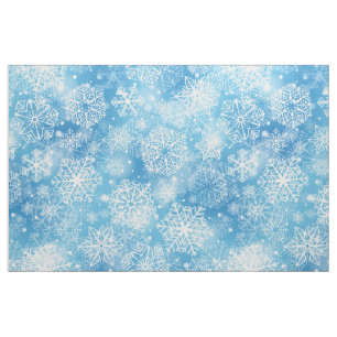 Schneeflocken auf blau stoff