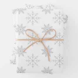 Schneeflocken auf weißem Papier