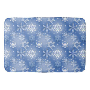 Schneeflocken auf Winterblau Badematte