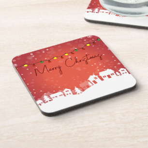 Schneeflocken bedeckten die Weihnachtshäuser Getränkeuntersetzer