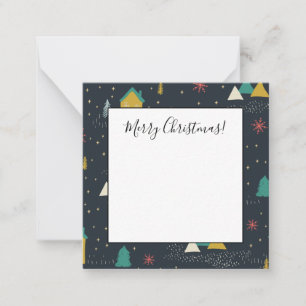 Schneeflocken fallen in einer Winternacht auf klei Mitteilungskarte