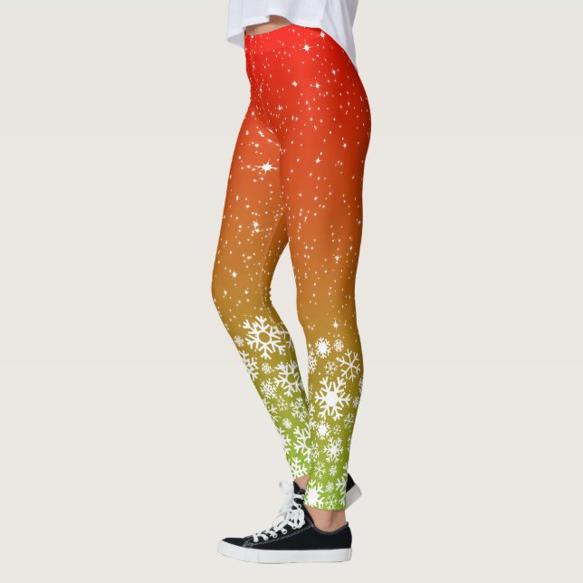 Schneeflocken in heißen tropischen Farben glänzen Leggings (Links)