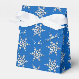 Schneeflocken, silberne Kristalle auf kobaltblau Geschenkschachtel