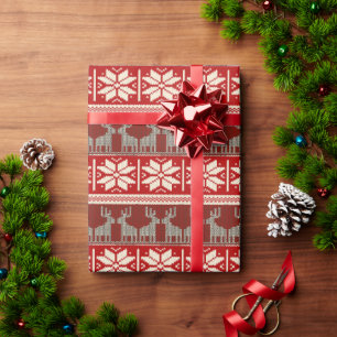 Schneeflocken und Rentiere Geschenkpapier