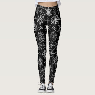 Schneeflockenmuster Weiß.Schwarzer Hintergrund Leggings