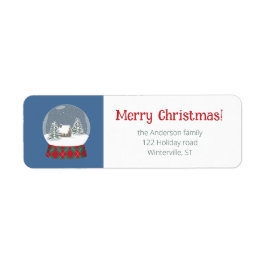 Schneekugel mit kleinem Haus -