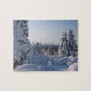 Schneelandschaft mit Tannen im Winter Puzzle