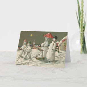 Schneemann Familie Winter Schneekirche spielend Feiertagskarte