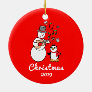 Schneemann mit dem Gitarren-und Pinguin-Jahr Keramik Ornament