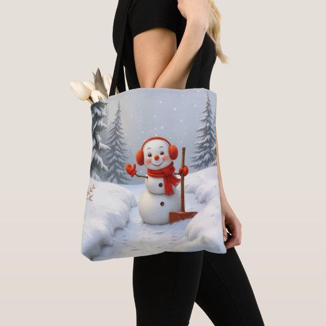 Schneemann mit einer roten Schaufel (Von Nahem)