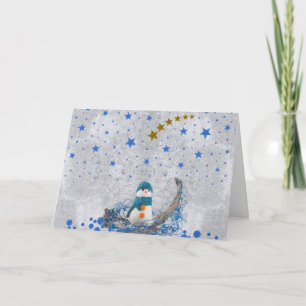 Schneemann mit funkelnd blauen Sternen Feiertagskarte