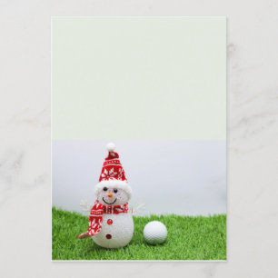 Schneemann und Golfball auf grünem Gras Weihnachte Einladung