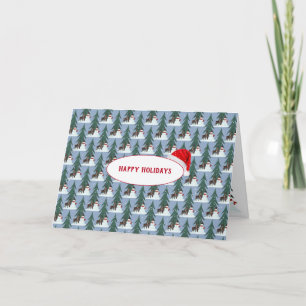 Schneemann und Reh in Schneeflocken auf blau Feiertagskarte