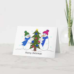 Schneemänner schmücken einen Weihnachtsbaum Feiertagskarte