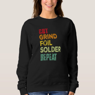 Schneiden von Schleiffoliensolder Wiederholung ver Sweatshirt