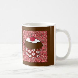 Schokoladen-Cupcake auf rotem und weißem Muster Tasse
