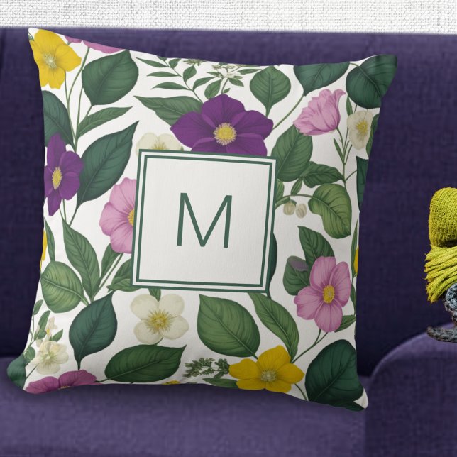 Schöne Elegante Blumen Prinsenblumen Kissen (A pretty monogrammed cushion with purple, pink, yellow and white flowers and green leaves)