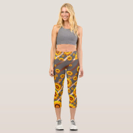 Schöne gelbe Blumen auf grauen, braunen Streifen Capri Leggings