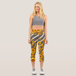 Schöne gelbe Blumen auf grauen, goldenen Streifen Capri Leggings