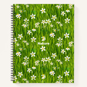 Schöne weiße Blumen auf grünen Blättern Notizbuch