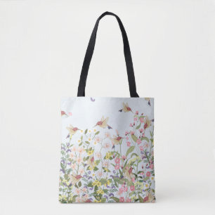Schöner Kolibri in einer blumengeschmückten Blume
