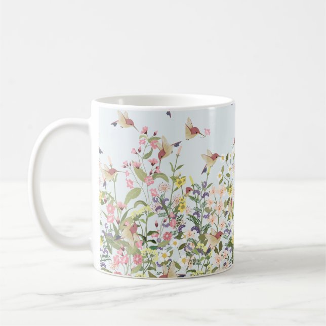 Schöner Kolibri in einer blumengeschmückten Blume Kaffeetasse (Links)