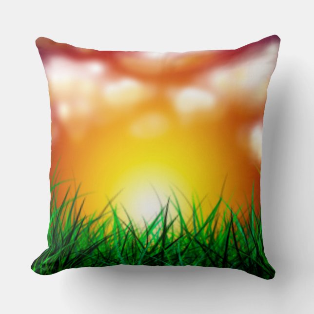 Schöner Sonnenaufgang über einem Grasfeld Kissen (Vorderseite)